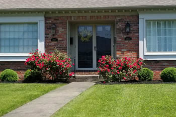 Lexington home with landscaping service by Allen's Lawn Service.